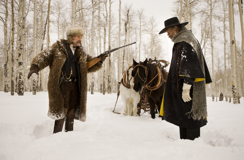 (L-R) KURT RUSSELL and SAMUEL L. JACKSON star in THE HATEFUL EIGHT.  Photo: Andrew Cooper, SMPSP © 2015 The Weinstein Company. All Rights Reserved.